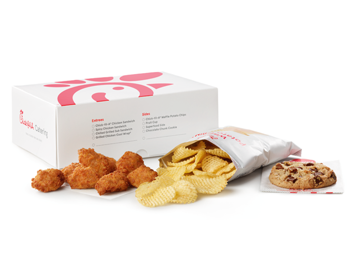 Chick-fil-A Packaged Meal with chicken nuggets, chips, and a cookie.